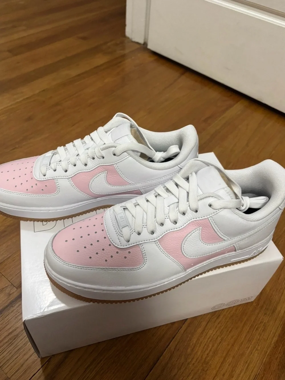 Nike Women’s White and Light Pink Low-Top Sneakers